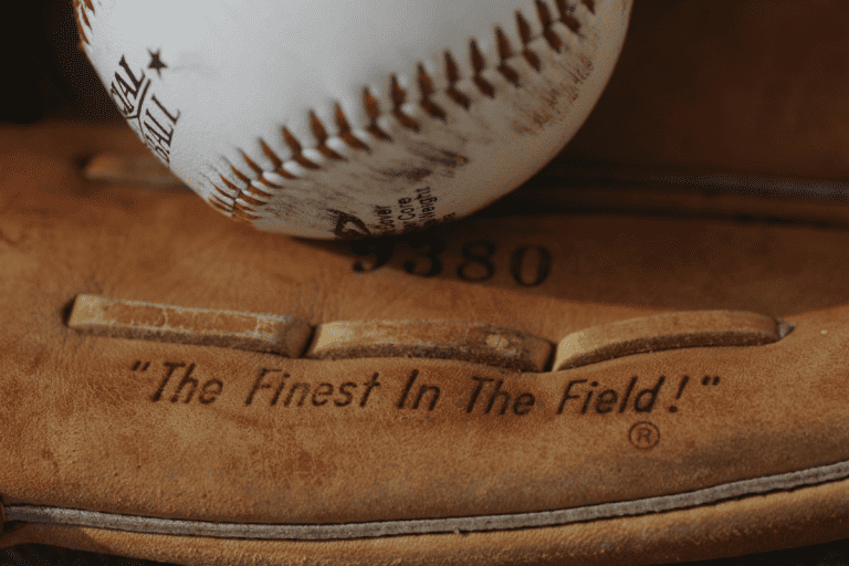 A baseball glove with a ball in it.