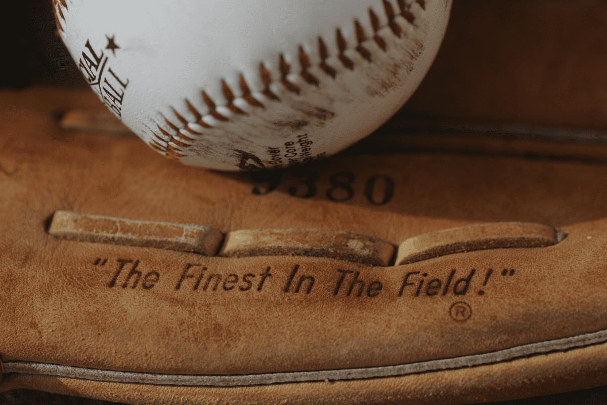 A baseball glove with a ball in it.