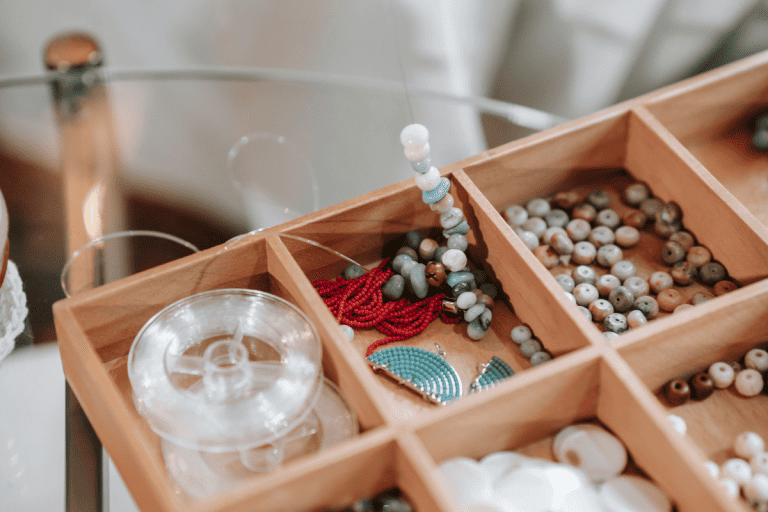 A box of jewelry making supplies.