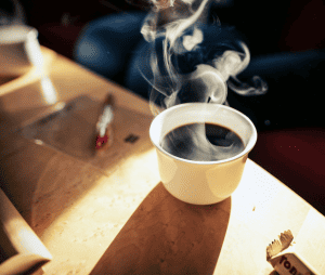 A cup of hot coffee.